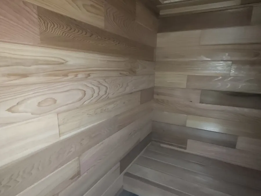Sauna sur mesure dans une cave à Bruxelles, passé planche par planche — photo 4